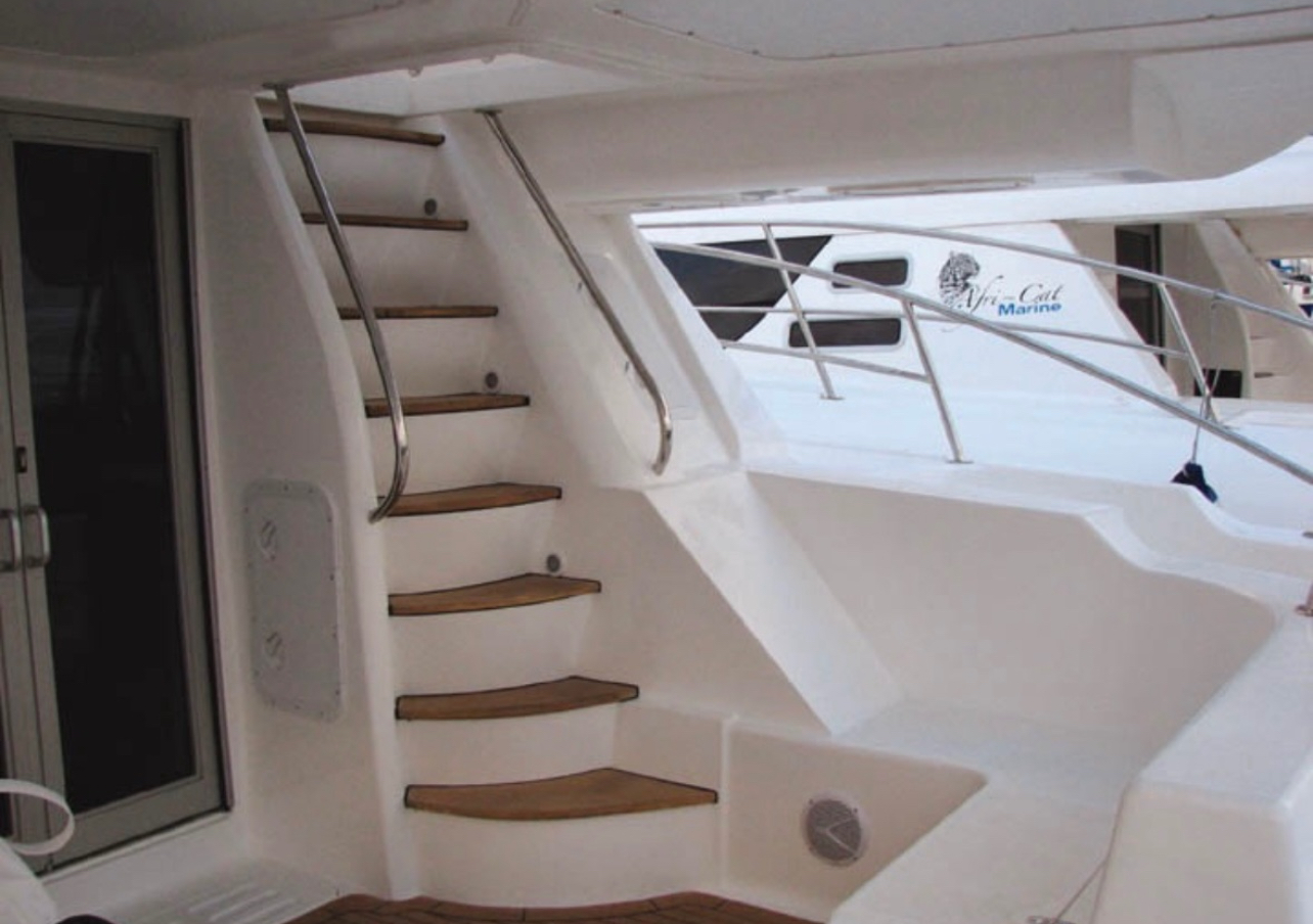 Stairway leading to the catamaran's upper deck